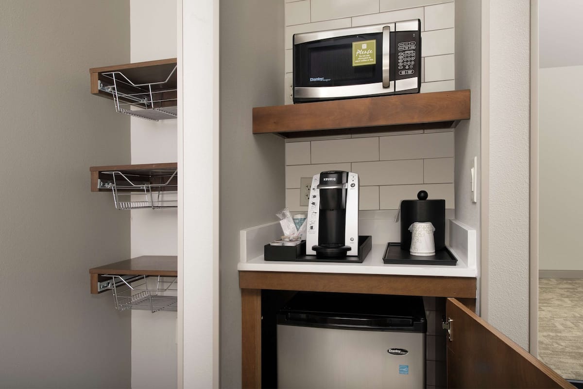 premium bedding, desk, laptop workspace, blackout curtains