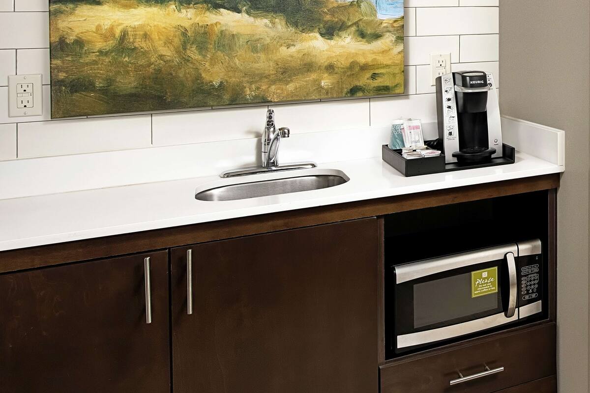 premium bedding, desk, laptop workspace, blackout curtains