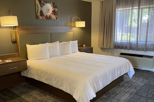 Individually furnished, desk, blackout drapes, iron/ironing board