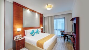 Executive Family Suite | Minibar, in-room safe, desk, laptop workspace - Donatello Hotel (Dubai)