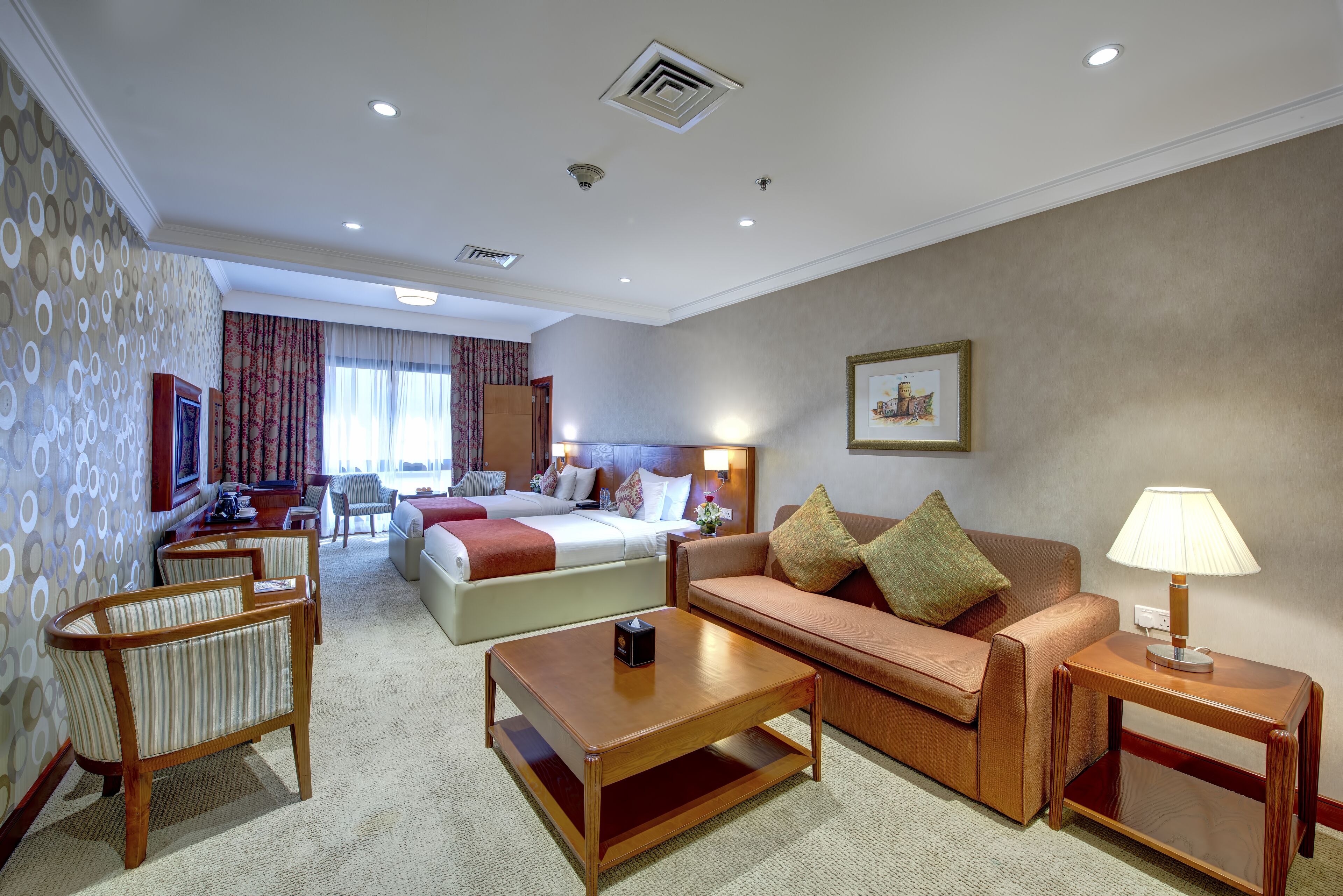 deluxe room (twin) | minibar, in-room safe, desk, laptop workspace