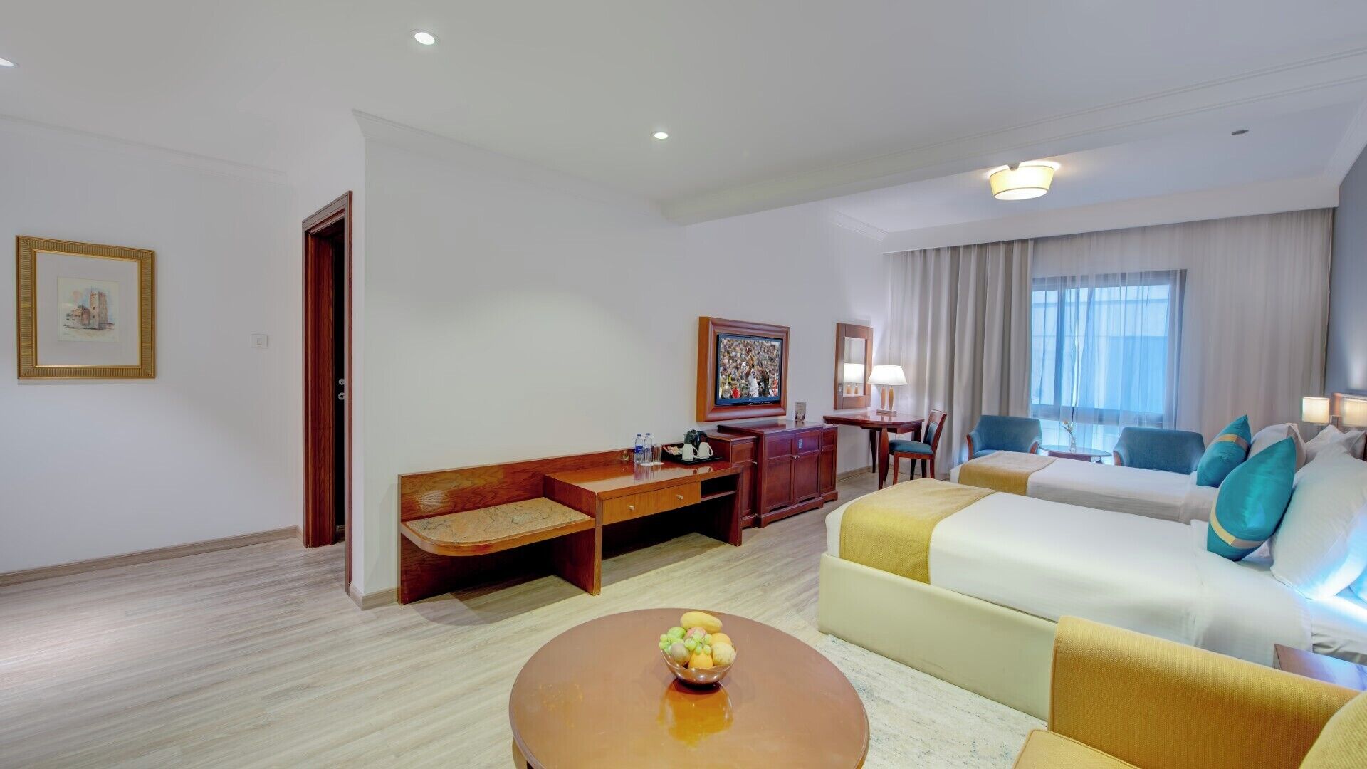 Deluxe Room (Twin) | Minibar, in-room safe, desk, laptop workspace