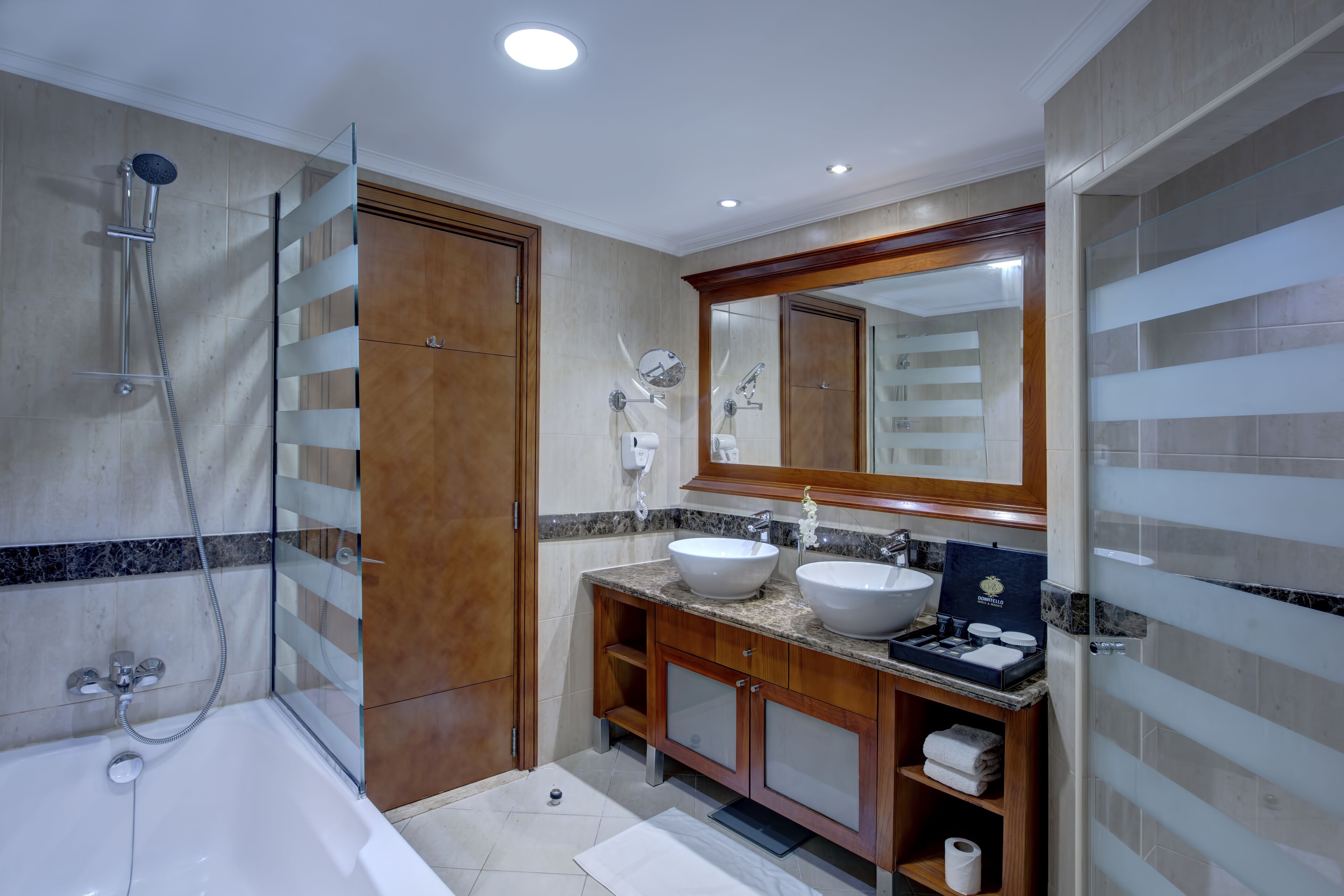 deep-soaking bathtub, free toiletries, hair dryer, bathrobes