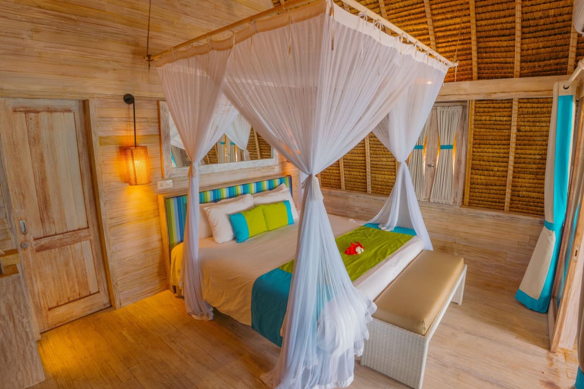 deluxe room, garden view, garden area | premium bedding, in-room safe, blackout curtains, free wifi