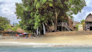 Beach nearby, white sand, 2 beach bars, surfing