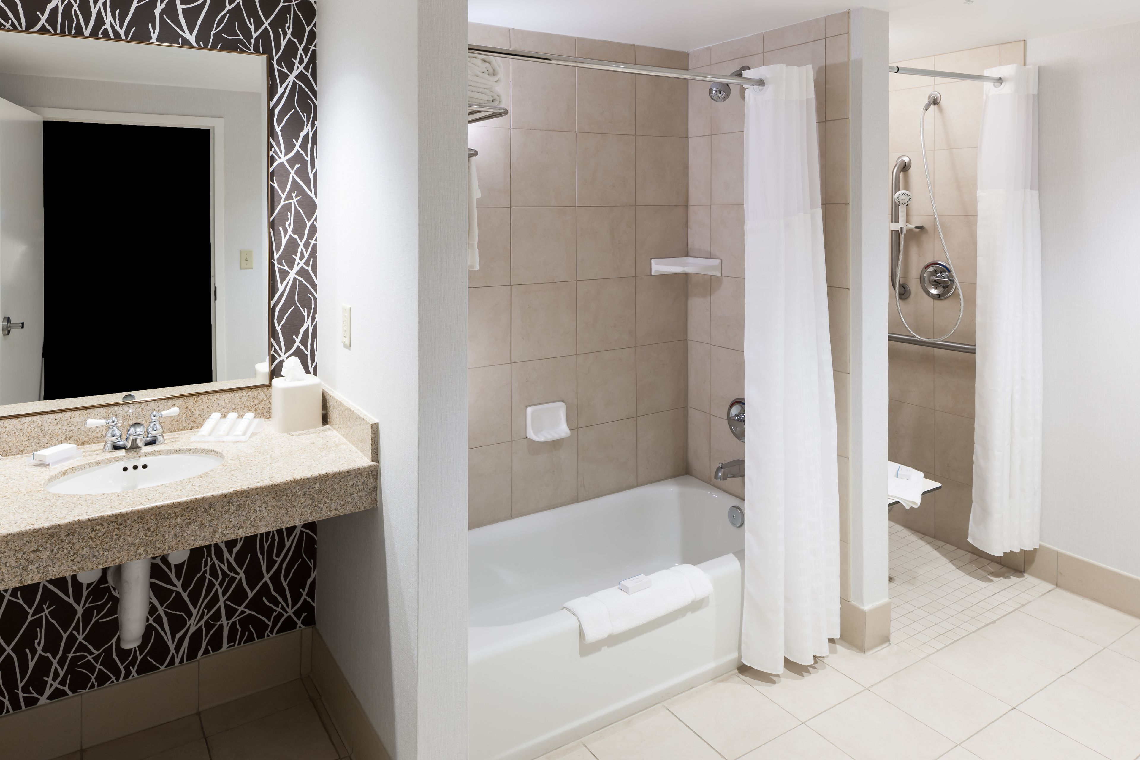 separate bathtub and shower, free toiletries, hair dryer, towels