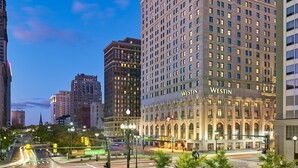 A high-rise hotel with a classic architectural design, featuring multiple floors and a prominent entrance. - The Westin Book Cadillac Detroit (Detroit)
