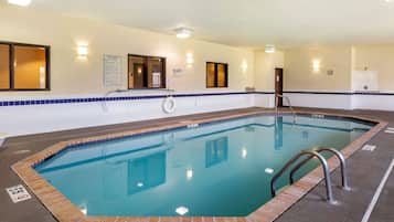 Indoor pool, open 10:00 AM to 10:00 PM, pool loungers