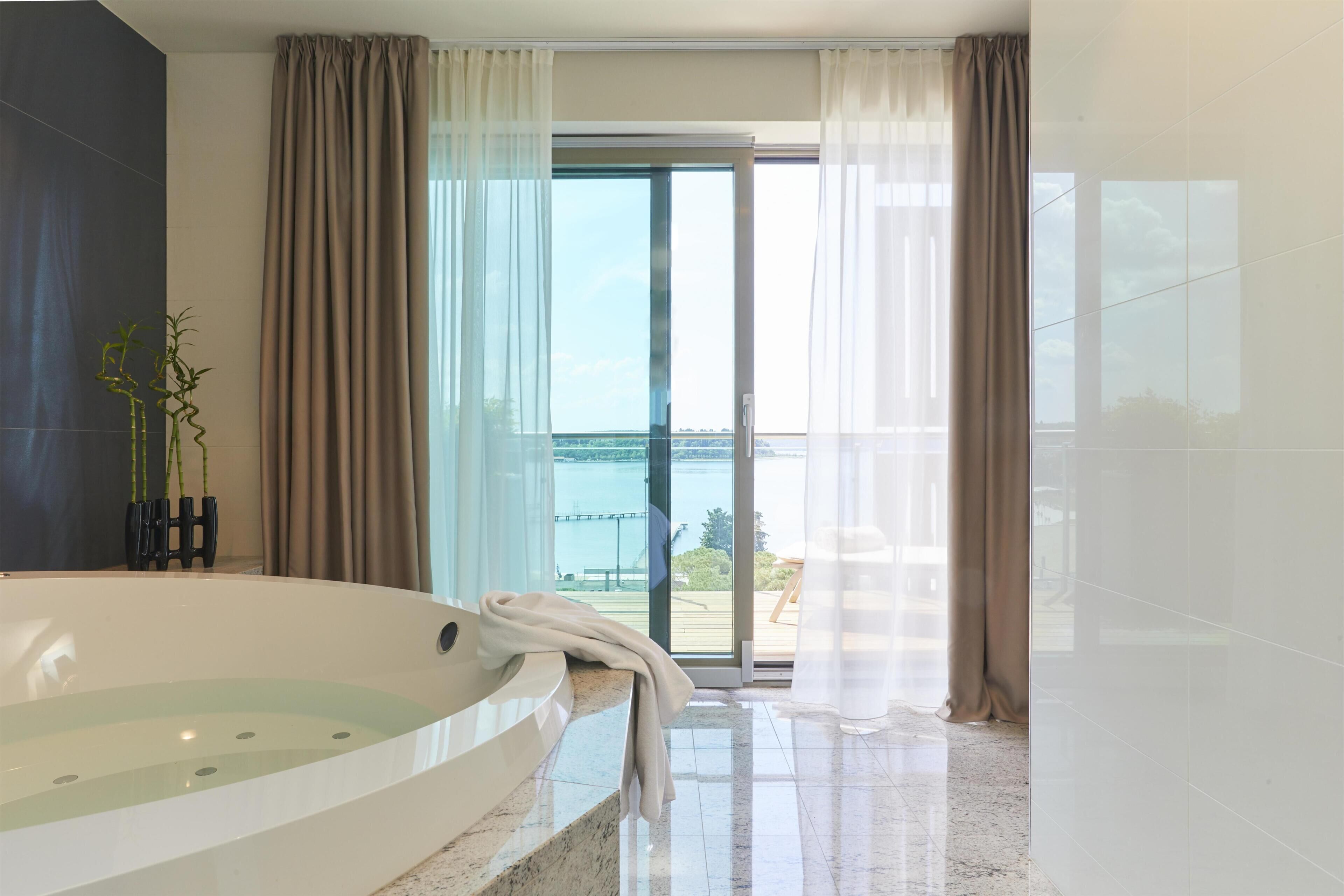 Designer toiletries, hair dryer, bathrobes, slippers