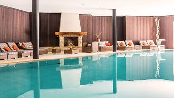 Indoor pool, open 7:00 AM to 9:00 PM, pool loungers
