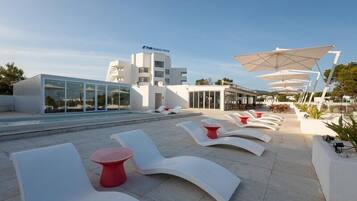 Outdoor pool, pool umbrellas, pool loungers