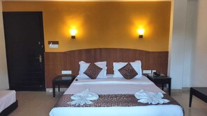 Premium Room, 1 King Bed | 1 bedroom, in-room safe, rollaway beds