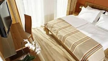 Lava Double Room | Premium bedding, pillowtop beds, individually decorated, desk
