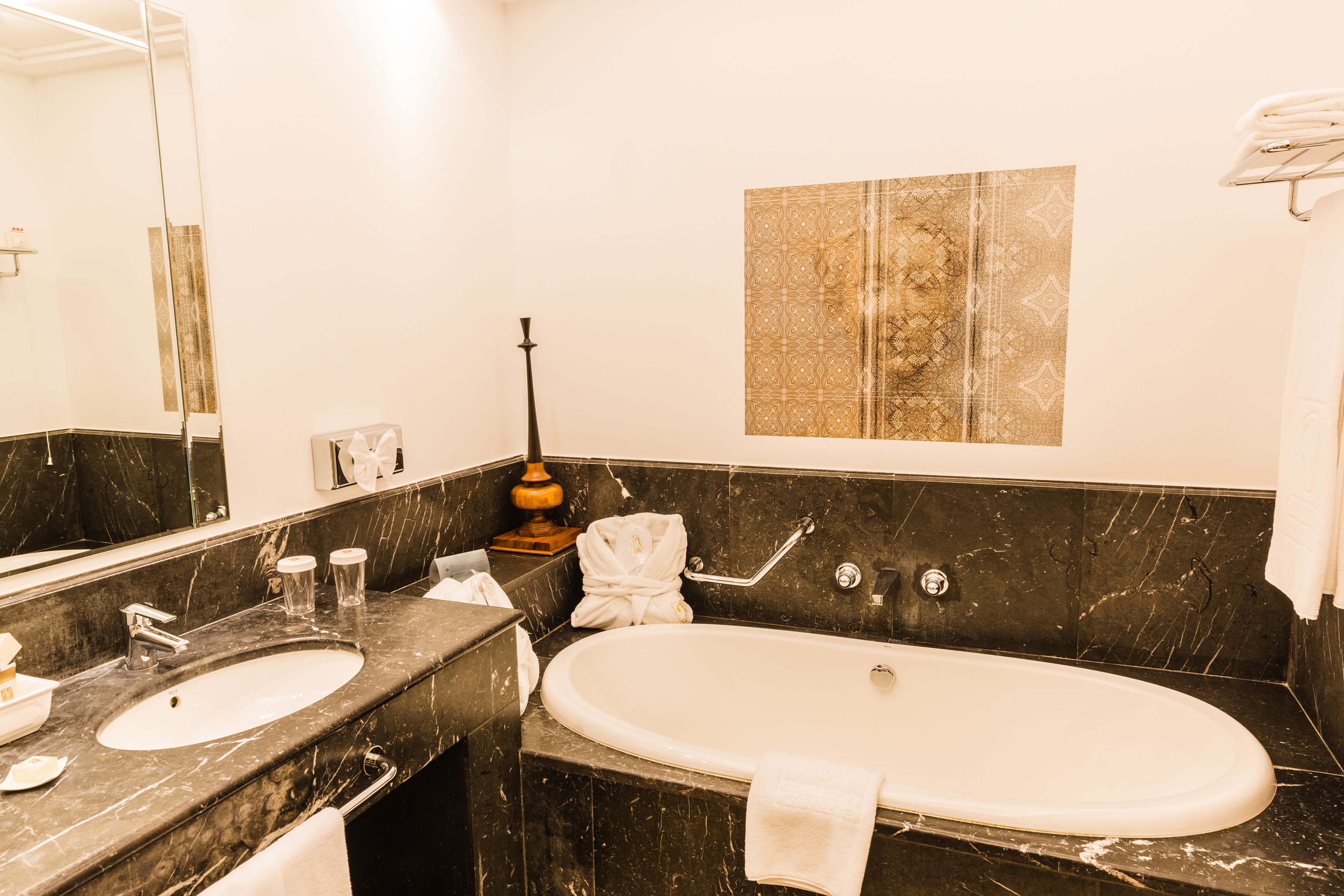 separate bathtub and shower, rainfall showerhead, hair dryer, bathrobes