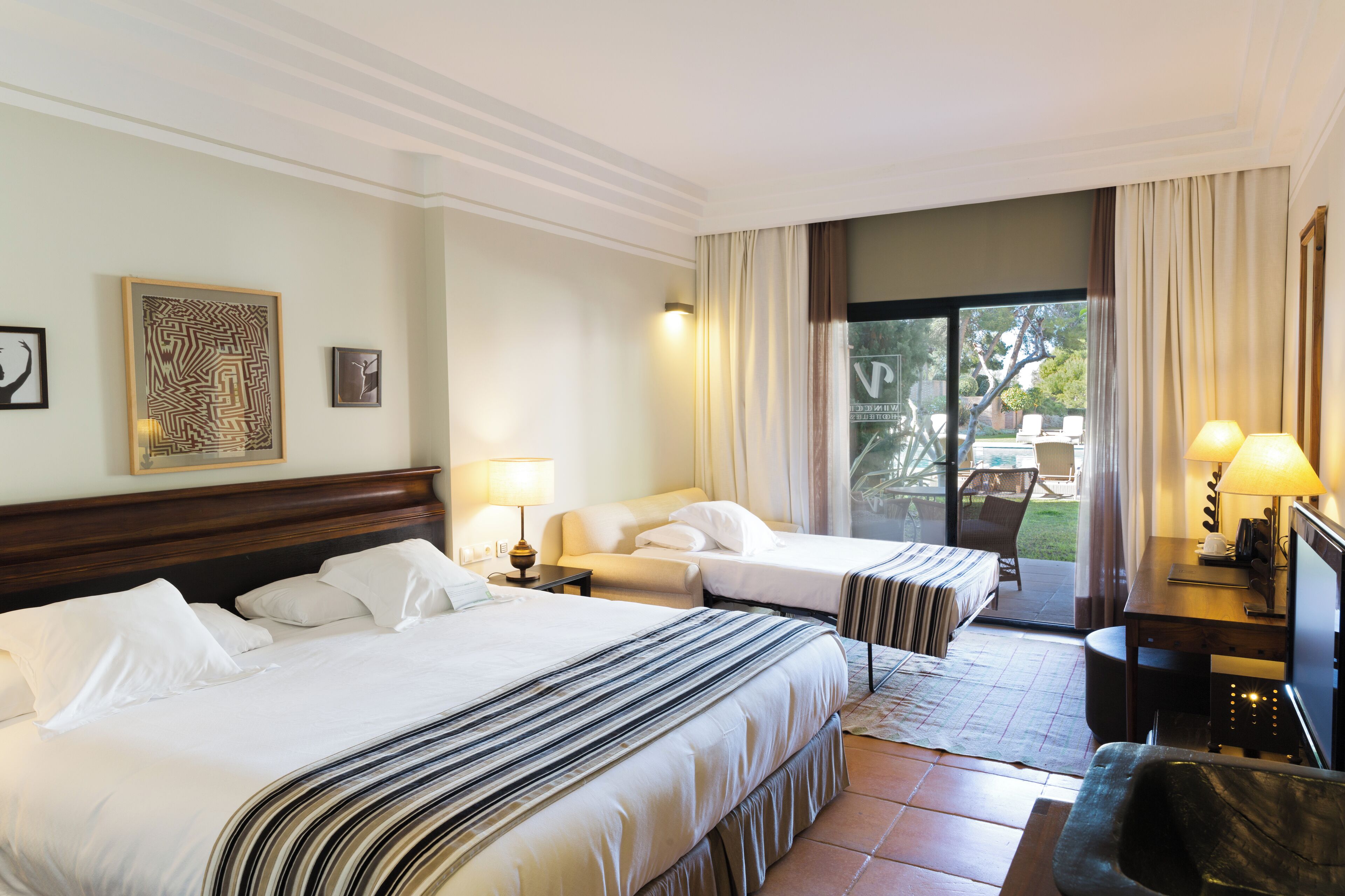 Premium bedding, down comforters, minibar, in-room safe