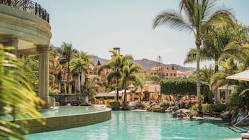 Outdoor pool, pool umbrellas, sun loungers