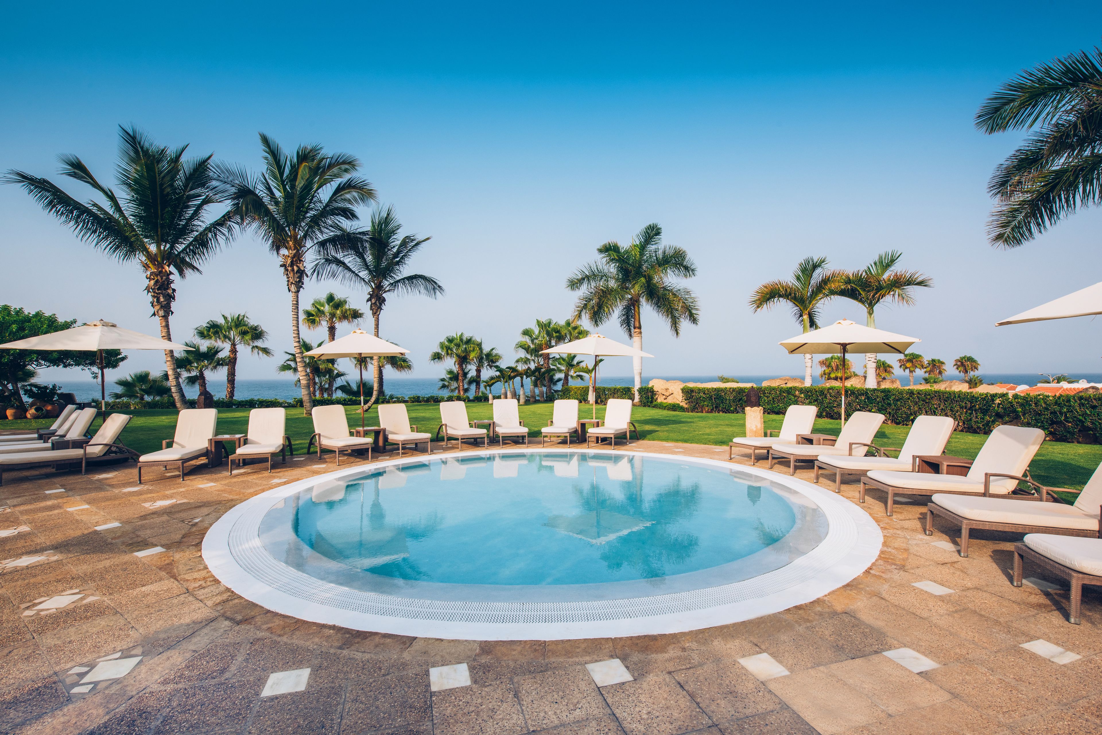 Outdoor pool, pool umbrellas, pool loungers