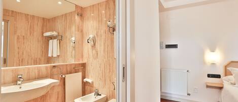 Premium bedding, down comforters, pillowtop beds, minibar