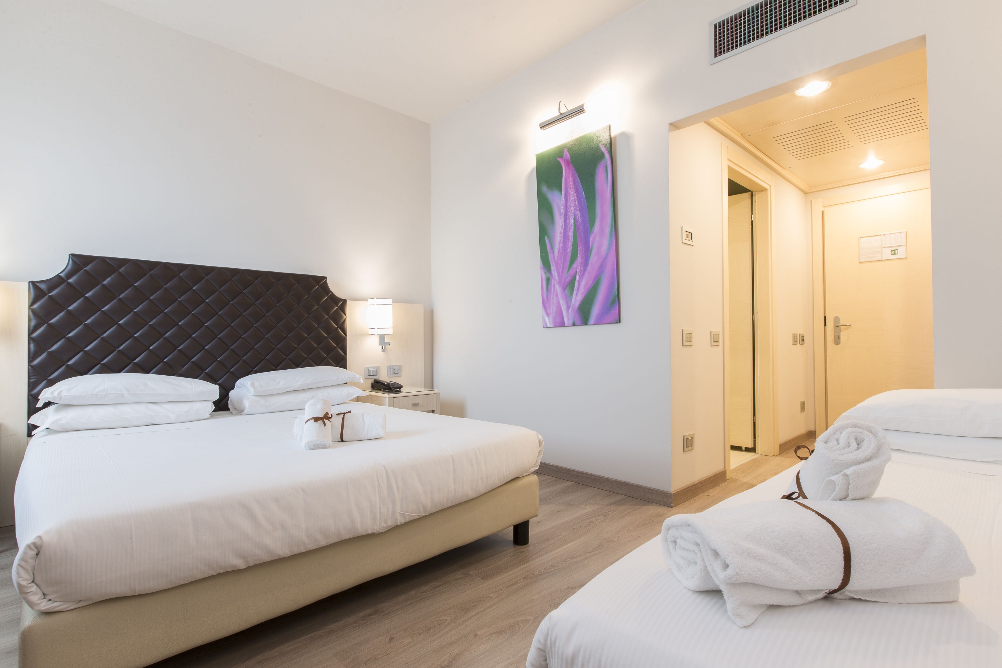 Classic Triple Room | Down comforters, minibar, in-room safe, desk