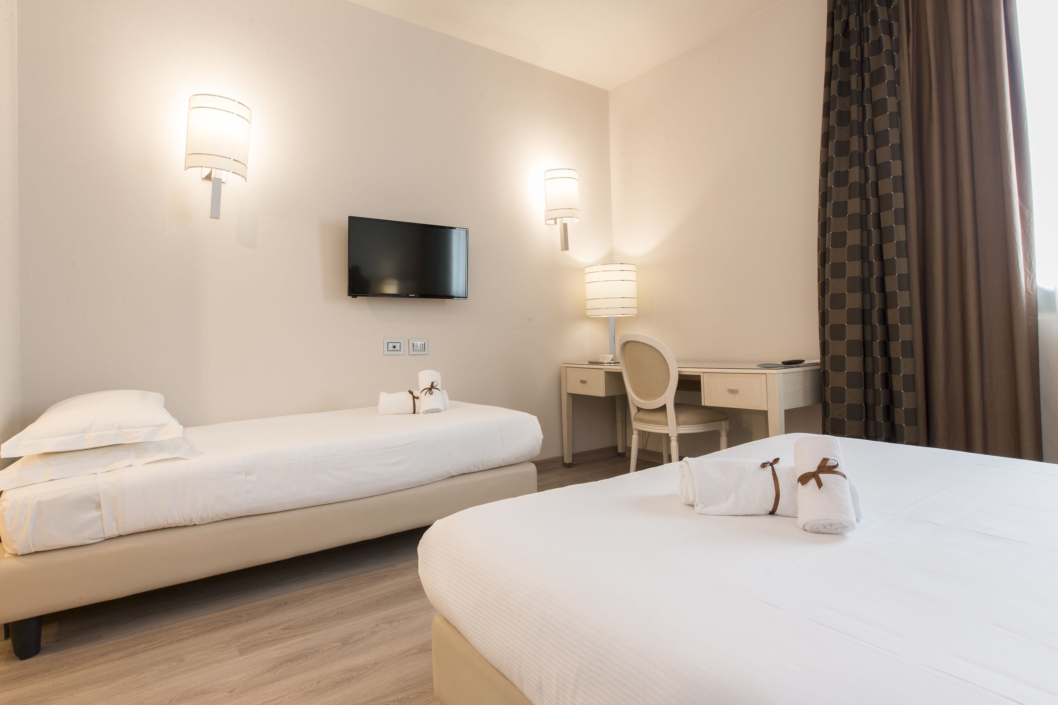 classic triple room | 1 bedroom, down duvets, minibar, in-room safe