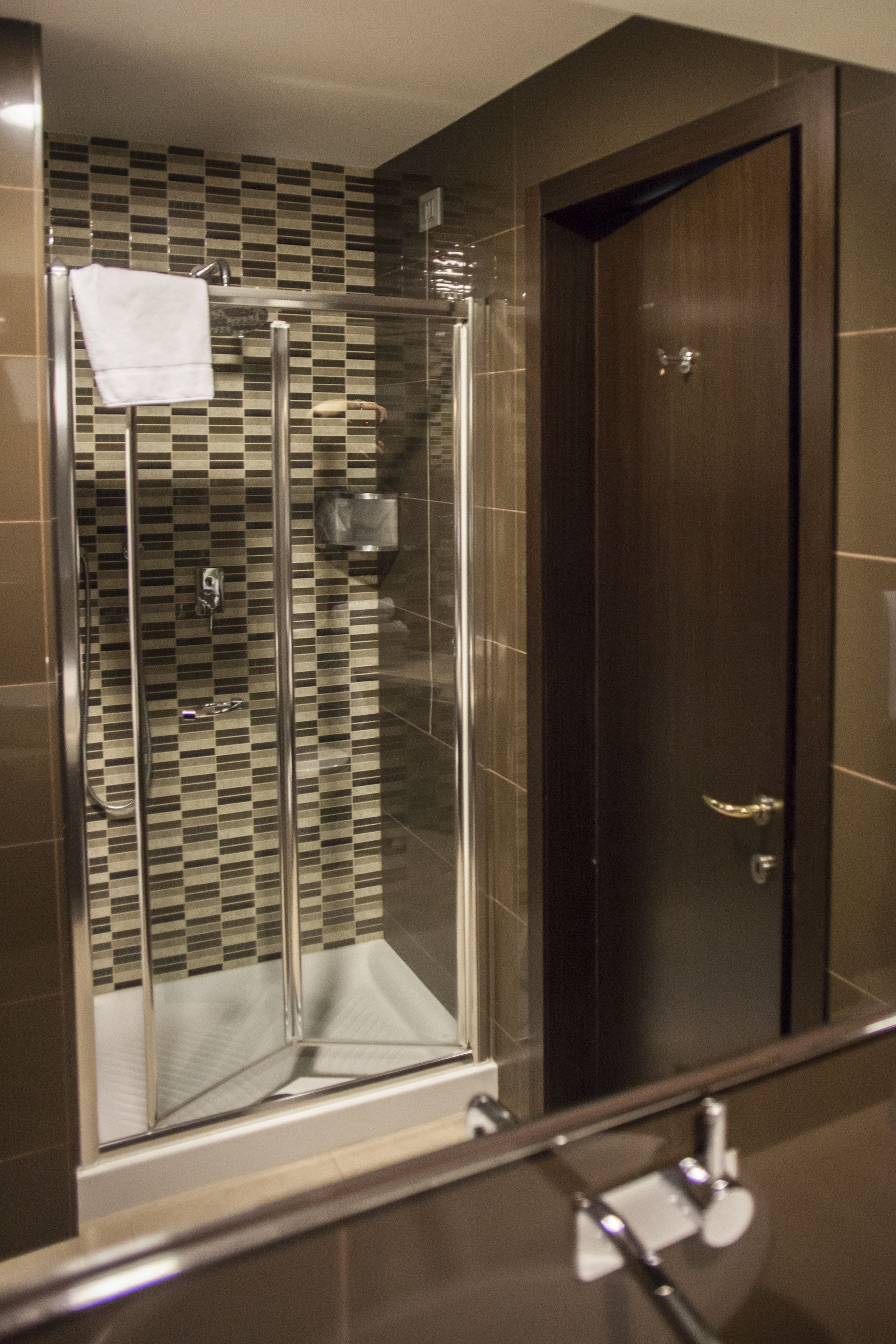 shower, free toiletries, hair dryer, slippers