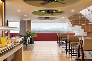A restaurant with a terrace, dining area, and a staircase. - Fiesta Americana Riviera Nayarit Resort All Inclusive & Spa (Nuevo Nayarit)