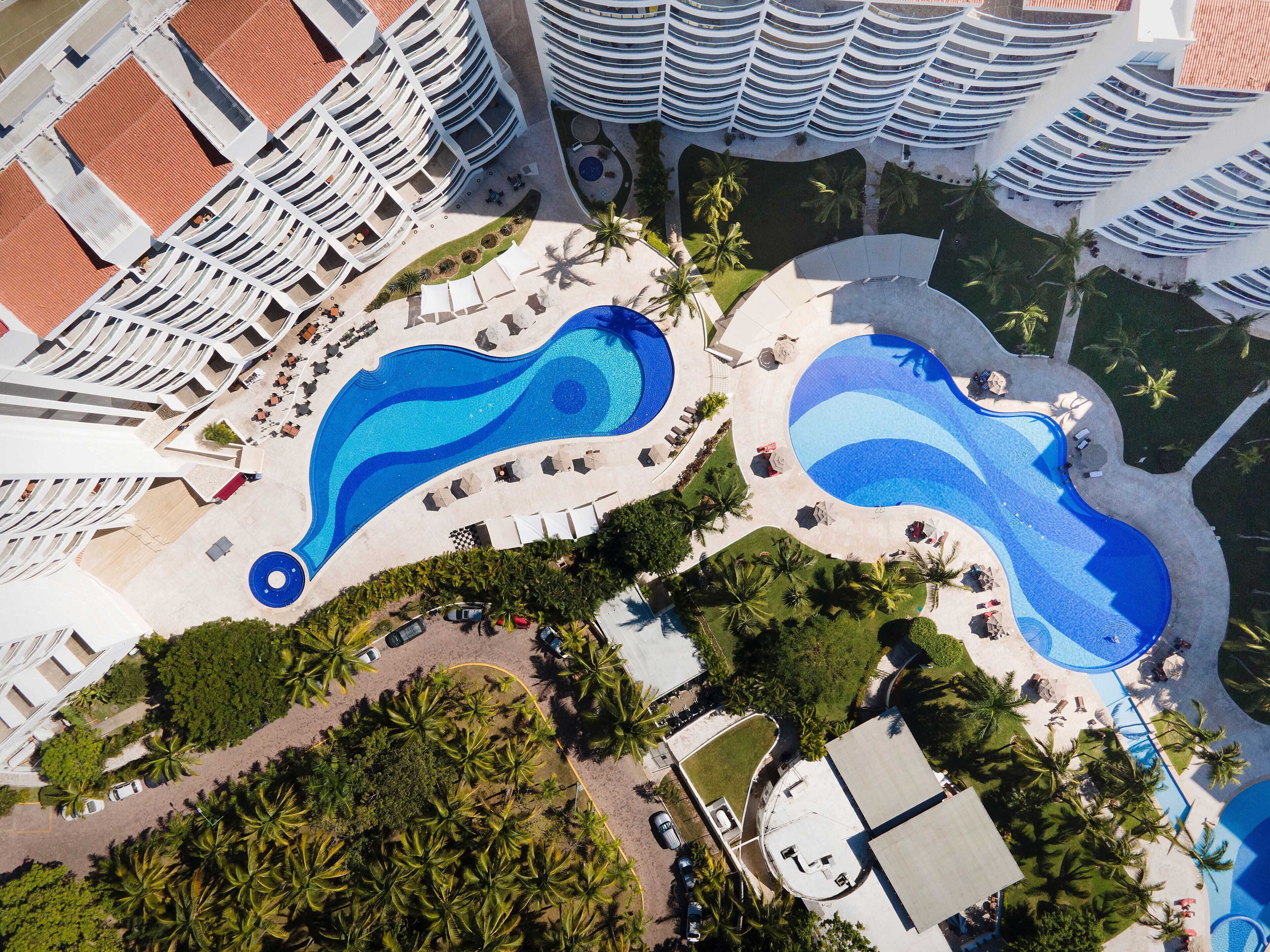 3 outdoor pools, cabanas (surcharge), pool umbrellas