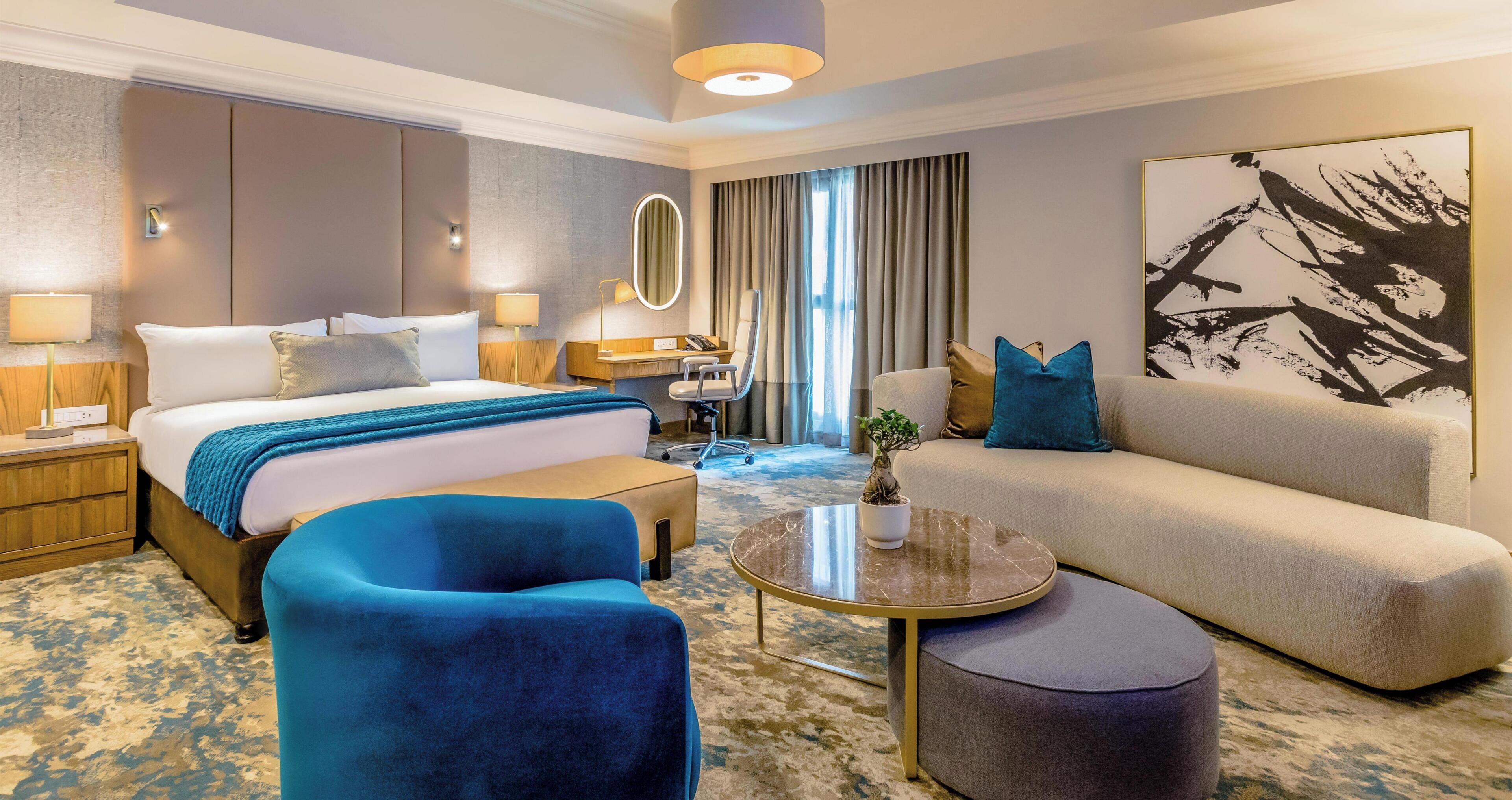 Hypo-allergenic bedding, minibar, in-room safe, desk