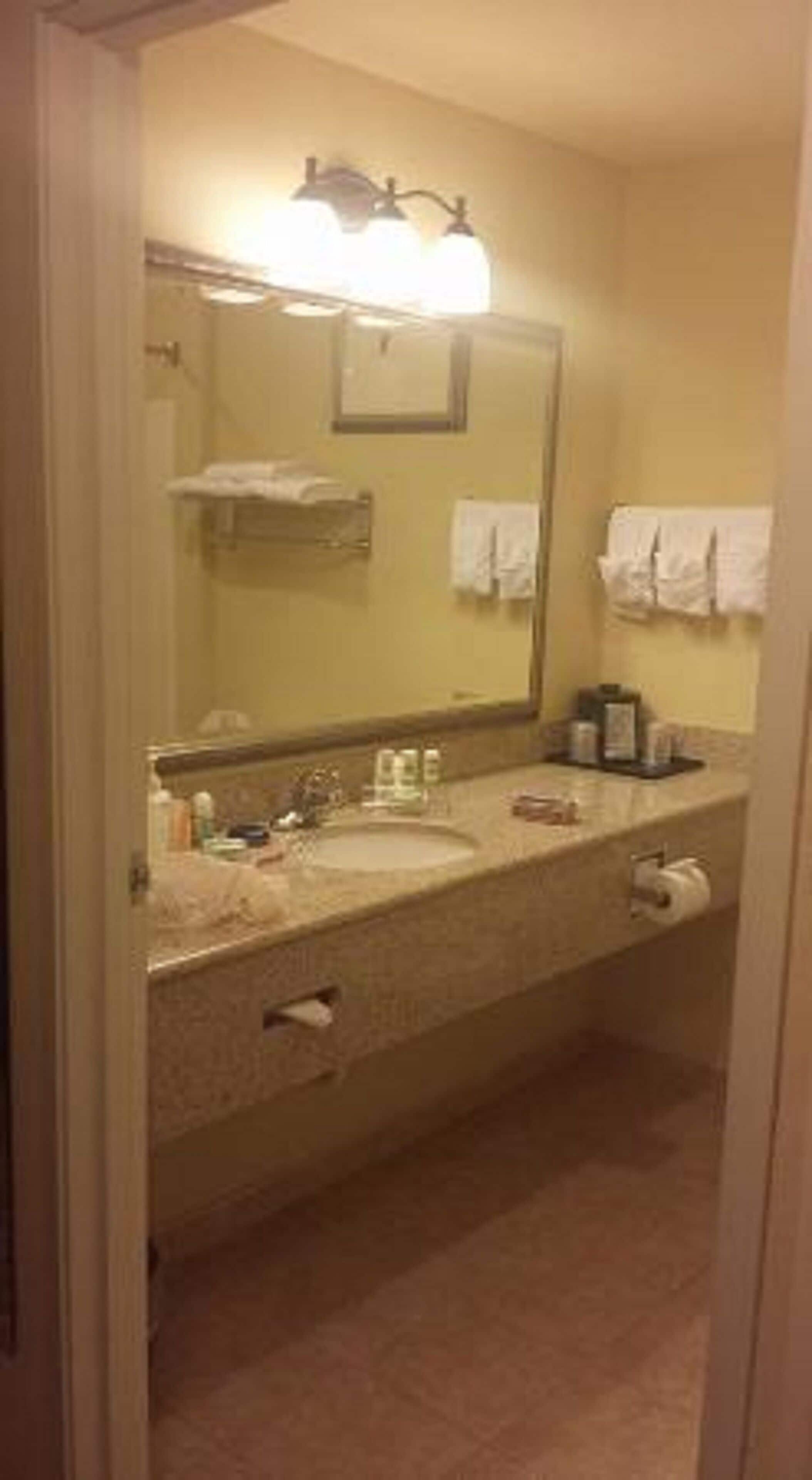combined shower/bathtub, hair dryer, towels, soap
