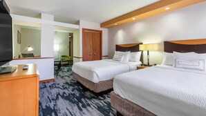 A hotel room with two beds, a desk with a TV, and a chair. - Fairfield Inn & Suites by Marriott Columbia (Columbia)