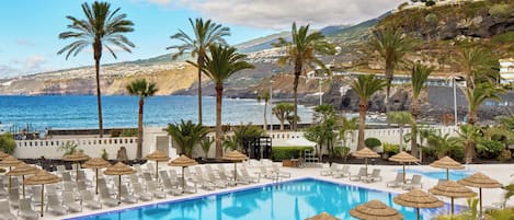 Outdoor pool, pool umbrellas, pool loungers