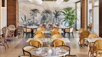 Breakfast, dinner served; international cuisine, pool views