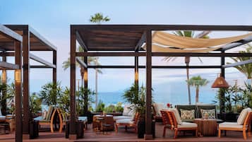 Breakfast, dinner served; international cuisine, pool views