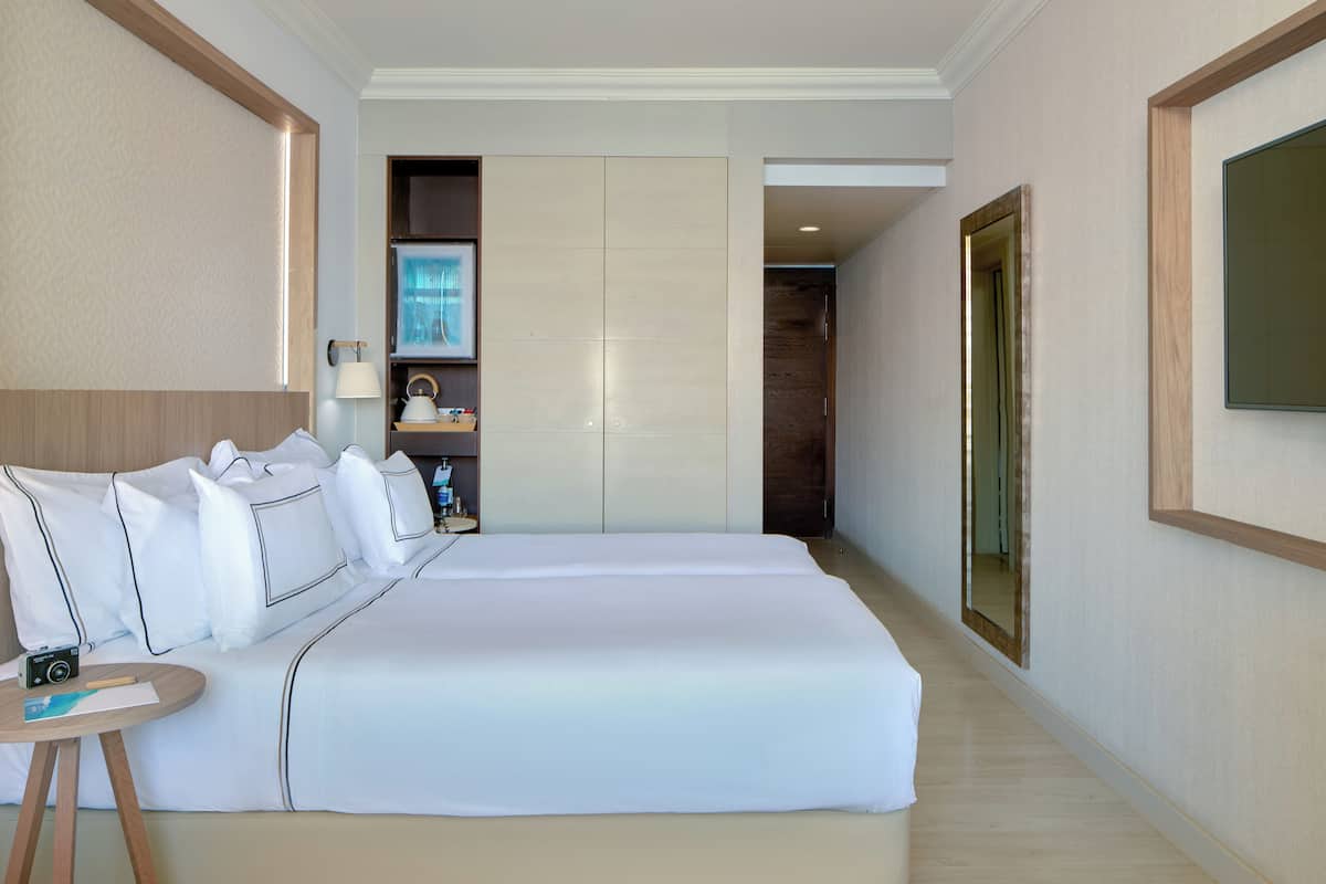 1 habitación, ropa de cama de alta calidad, cubrecamas y minibar