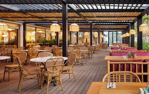 Breakfast, dinner served; international cuisine, pool views