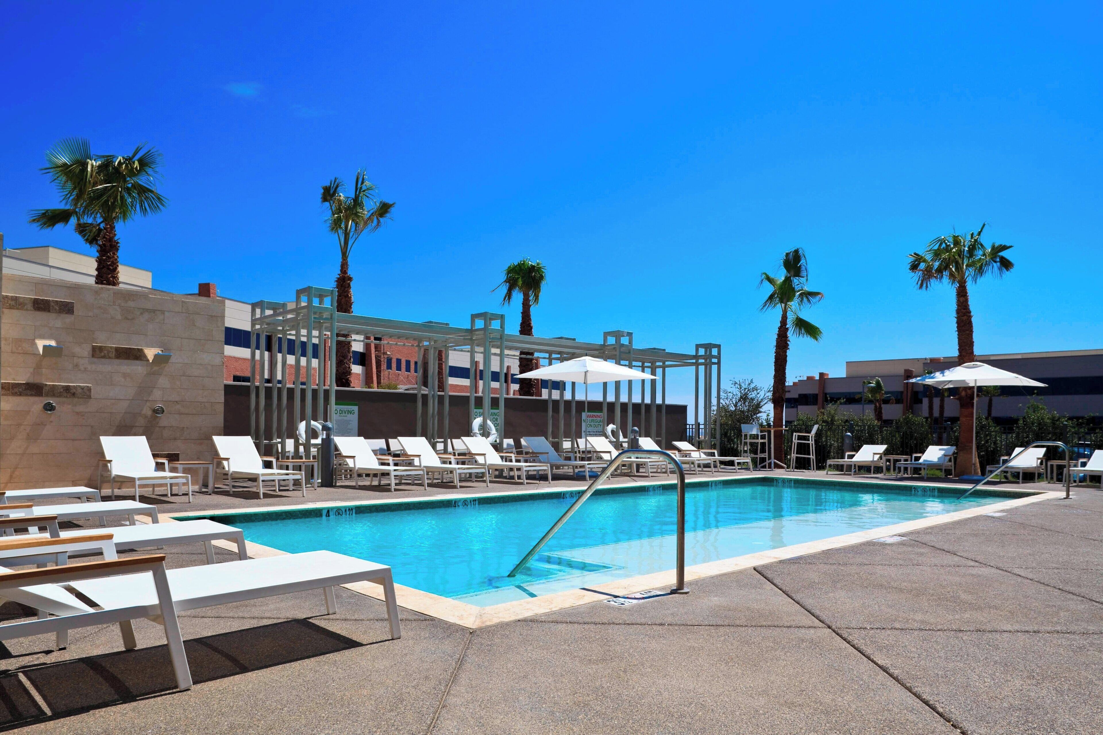 outdoor pool, open 8 am to 10:00 pm, free pool cabanas