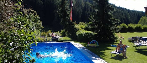 Seasonal outdoor pool, pool umbrellas, sun loungers