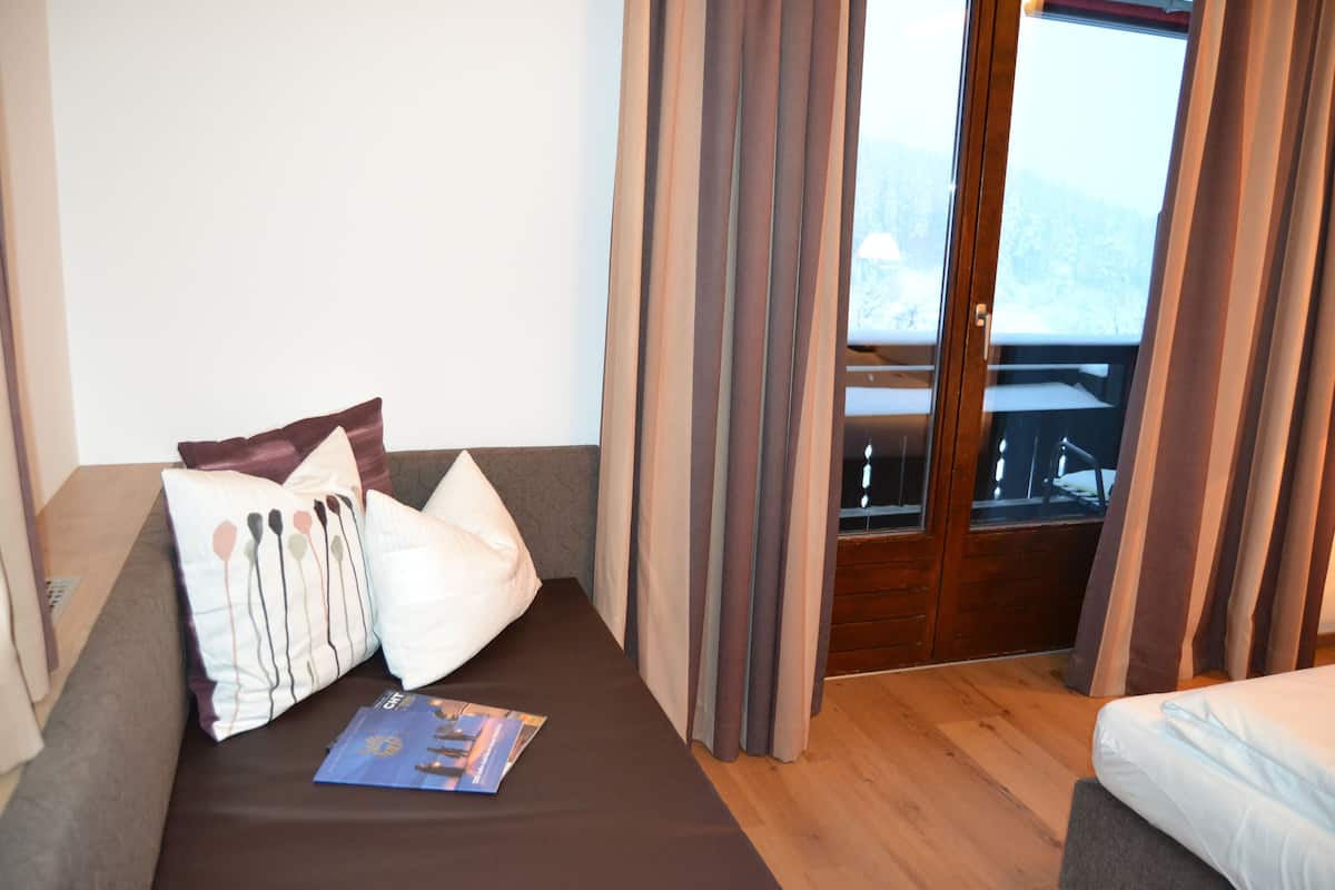 family room, 2 bedrooms | balcony view