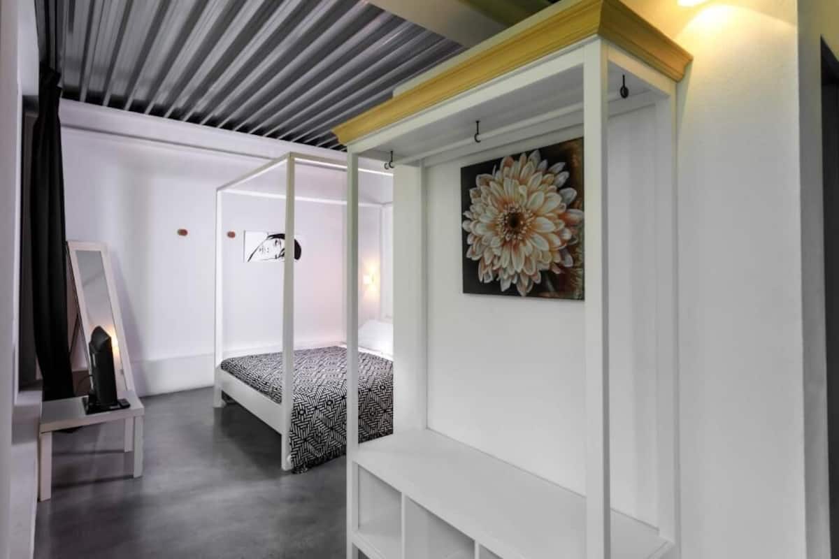 Premium bedding, Select Comfort beds, desk, blackout drapes