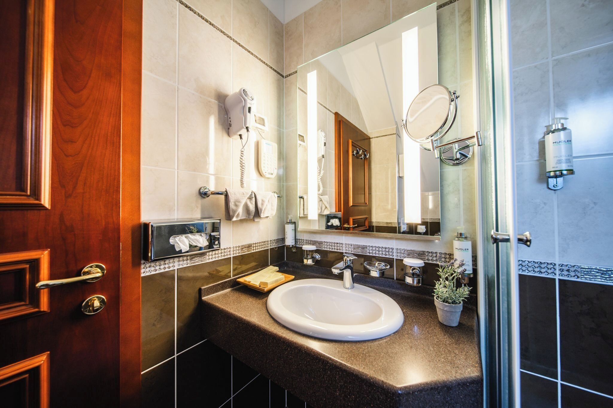 suite, 1 king bed | bathroom | designer toiletries, hair dryer, bathrobes, slippers