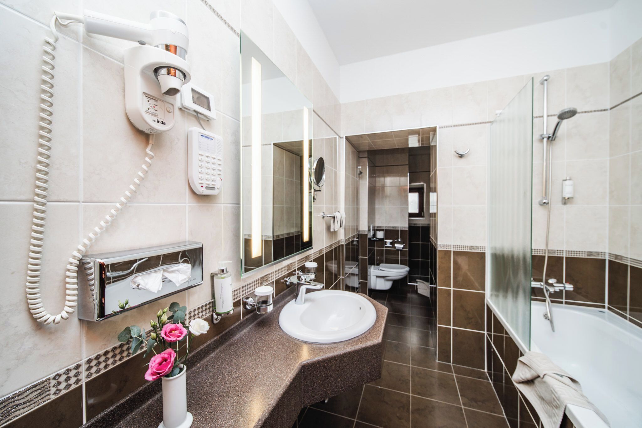 deluxe double room | bathroom | designer toiletries, hair dryer, bathrobes, slippers