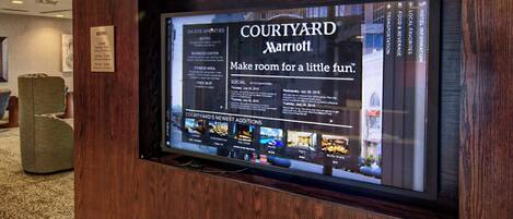 A digital display advertising Courtyard Marriott with a focus on its amenities and new additions.