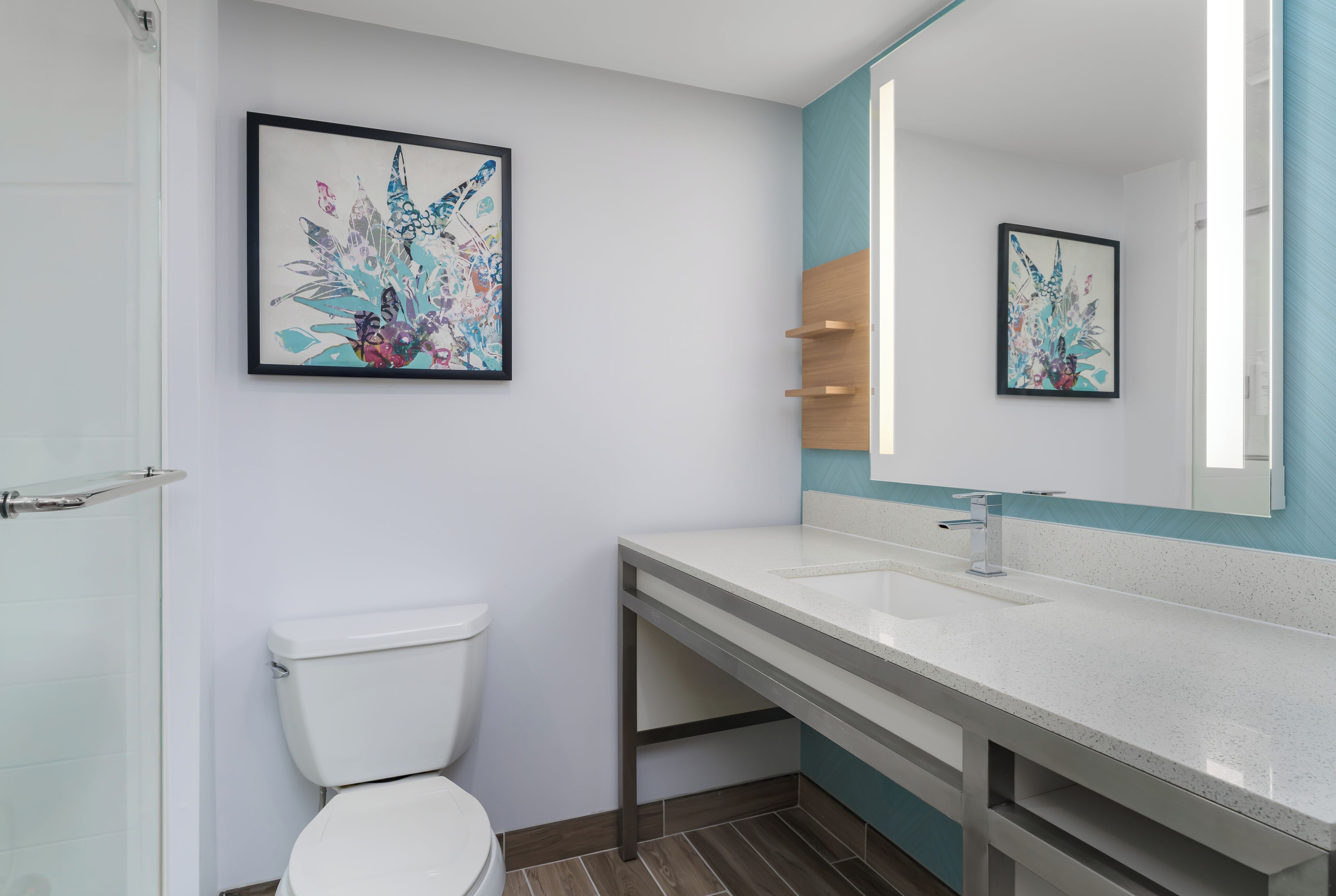 designer toiletries, hair dryer, towels