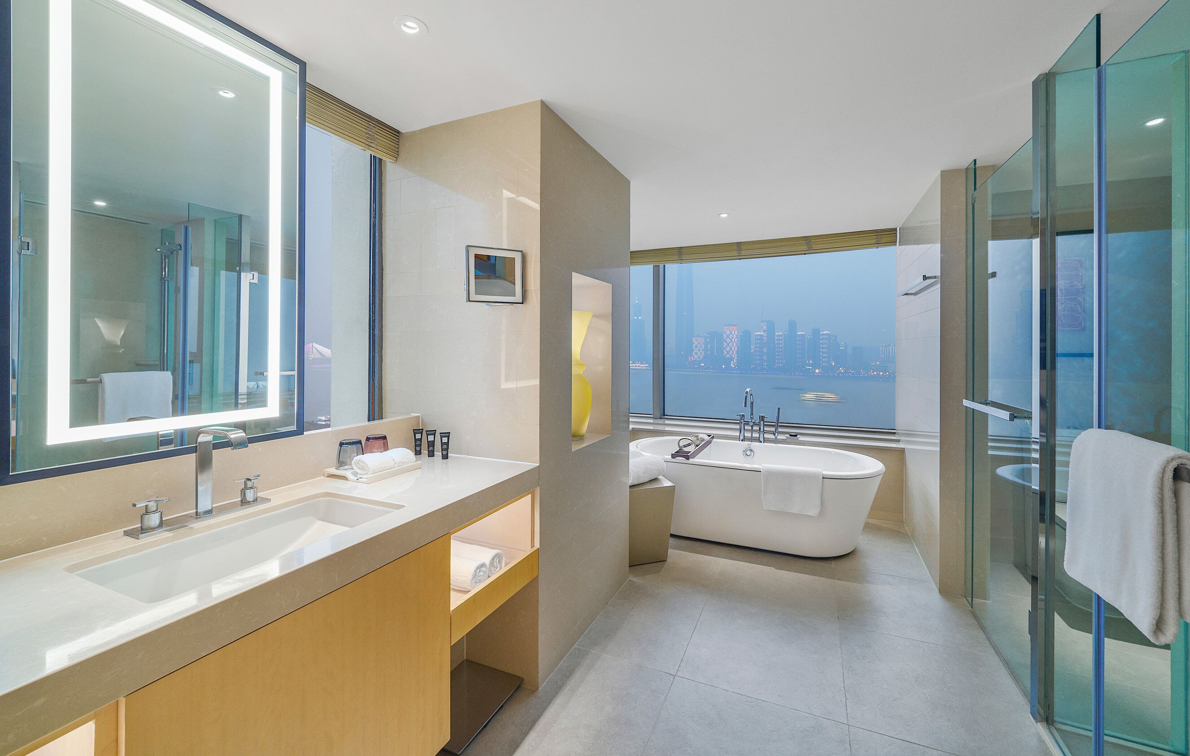 premier room, 1 king bed | bathroom | hair dryer, bathrobes, slippers, towels