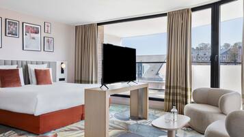 Ropa de cama de alta calidad, minibar, caja fuerte y escritorio