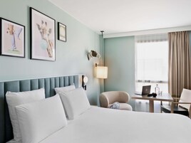 Ropa de cama de alta calidad y minibar 