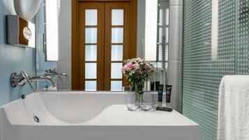 Shower, eco-friendly toiletries, hair dryer, towels