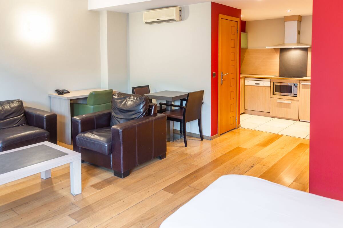 Apartment (Group 1 to 5 People) | Living area | Flat-screen TV