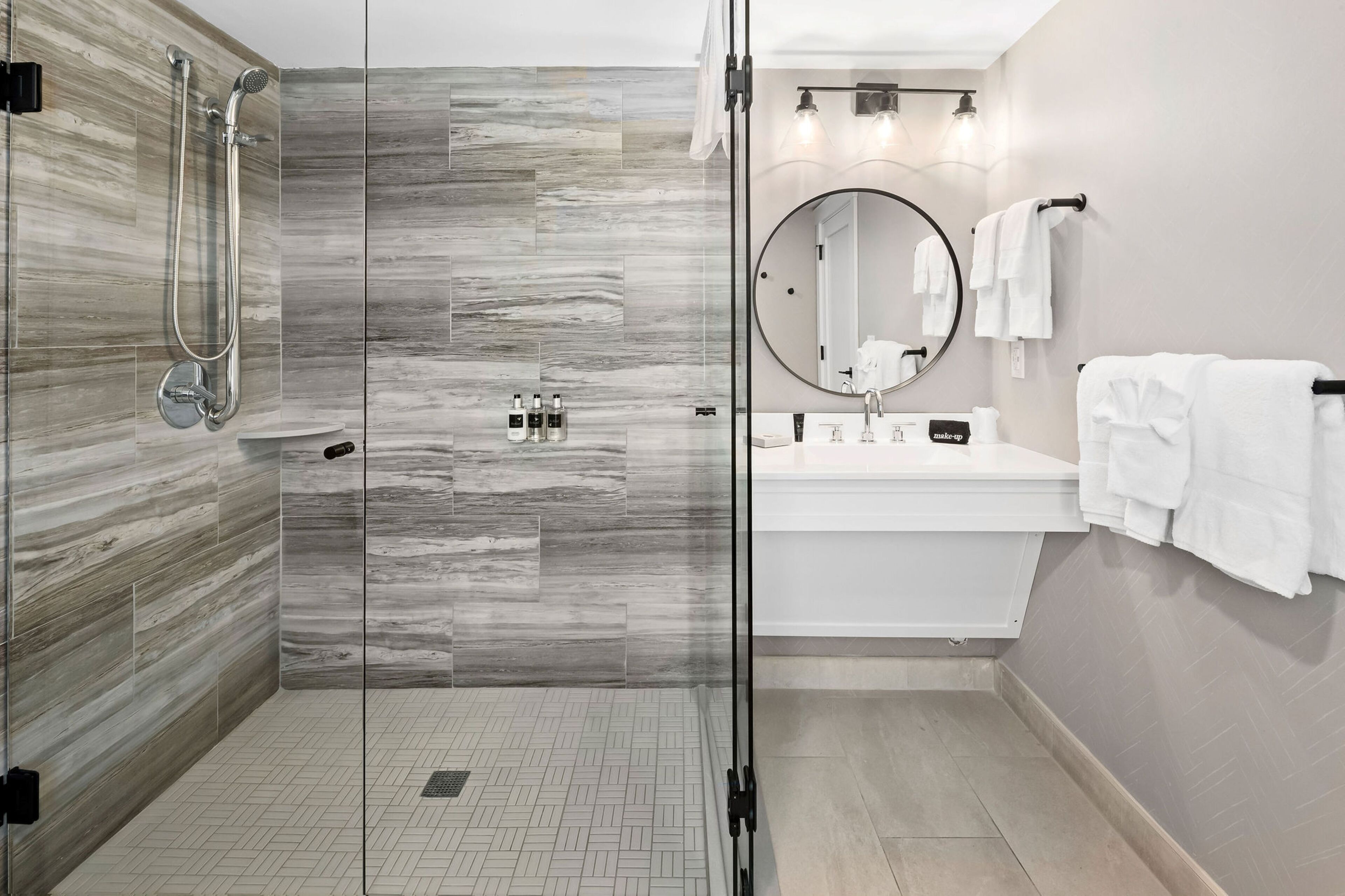 pelham 1 king ada | bathroom | shower, designer toiletries, hair dryer, towels