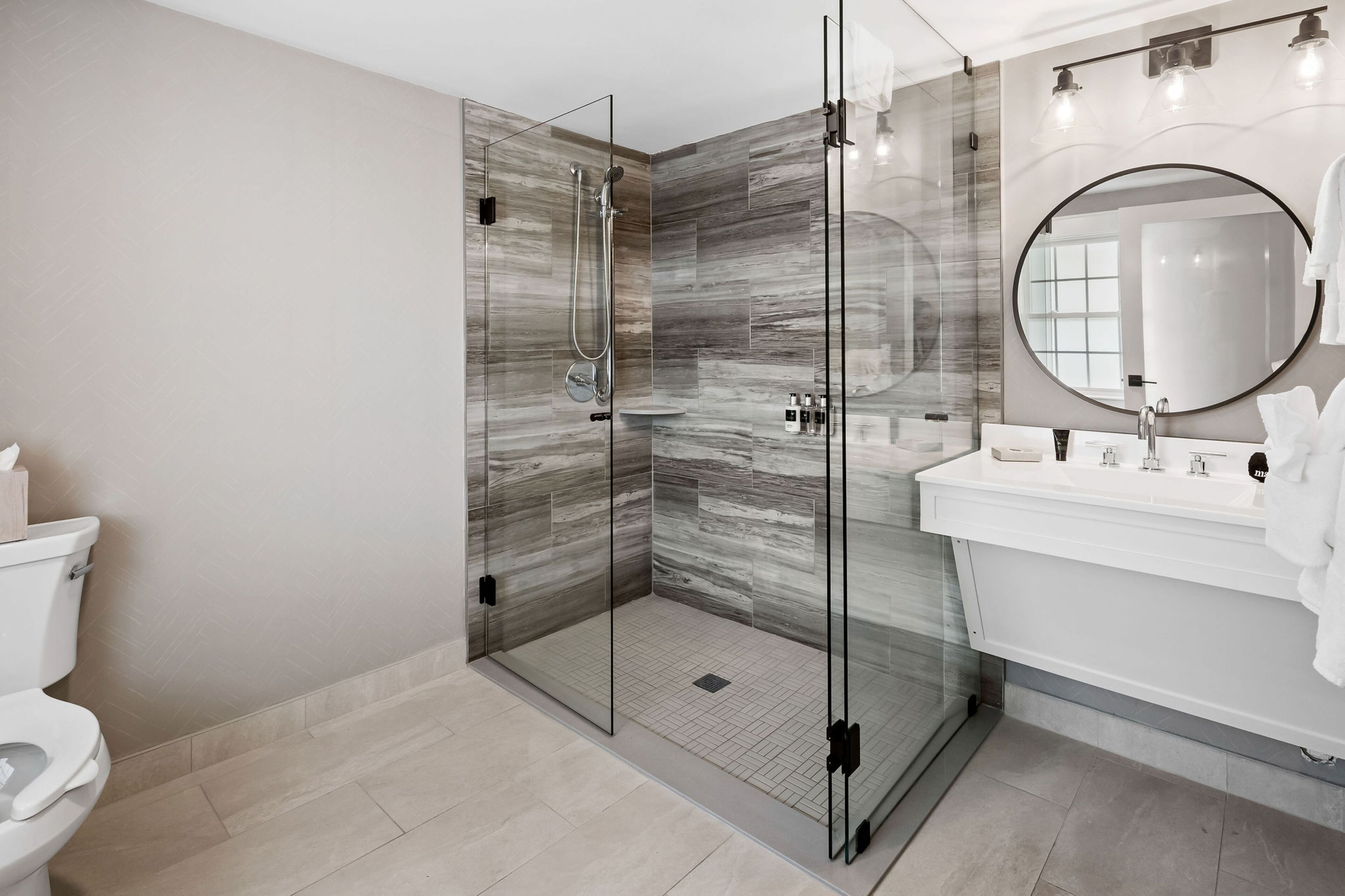 pelham 1 king ada | bathroom | shower, designer toiletries, hair dryer, towels